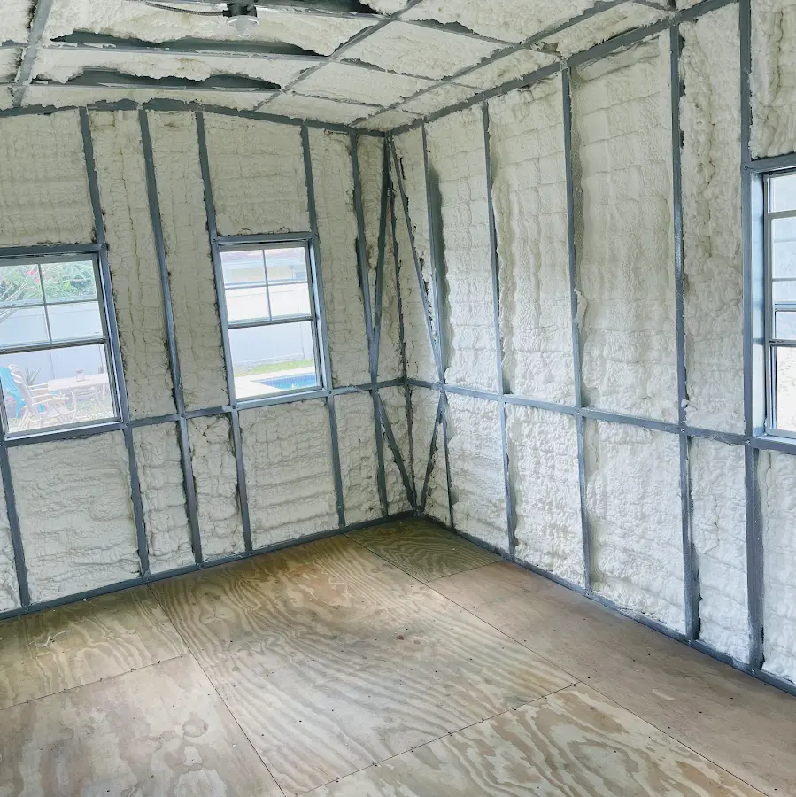 Closed-cell spray foam insulation applied to wall cavities in a residential project in Yorktown